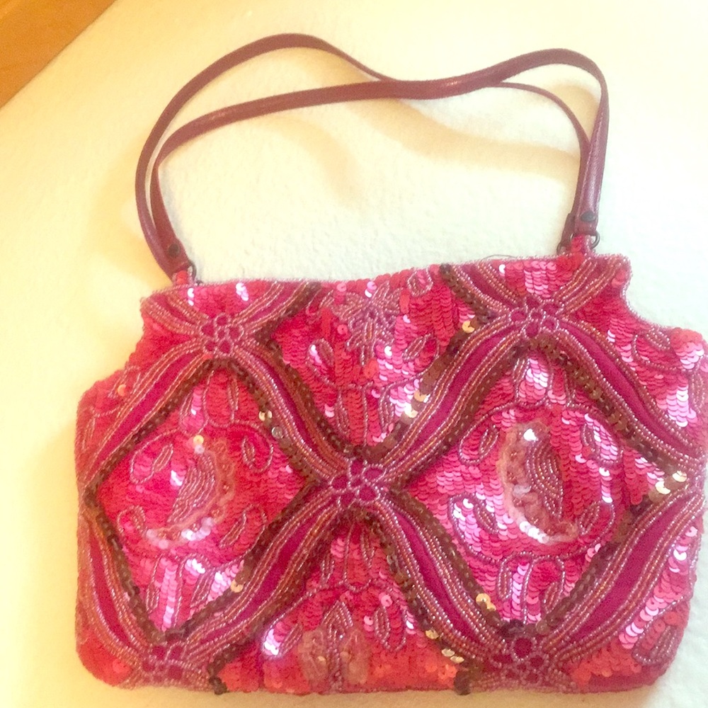 Beautiful beaded bright colored purse.